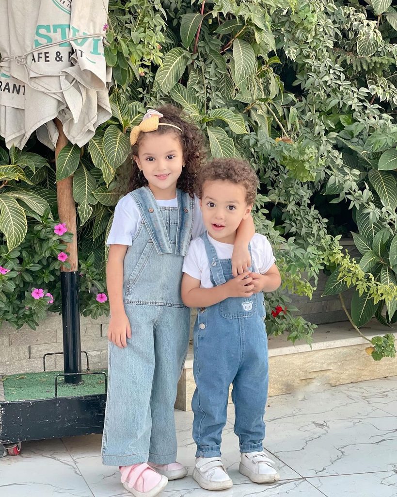 kids in matching overall denim