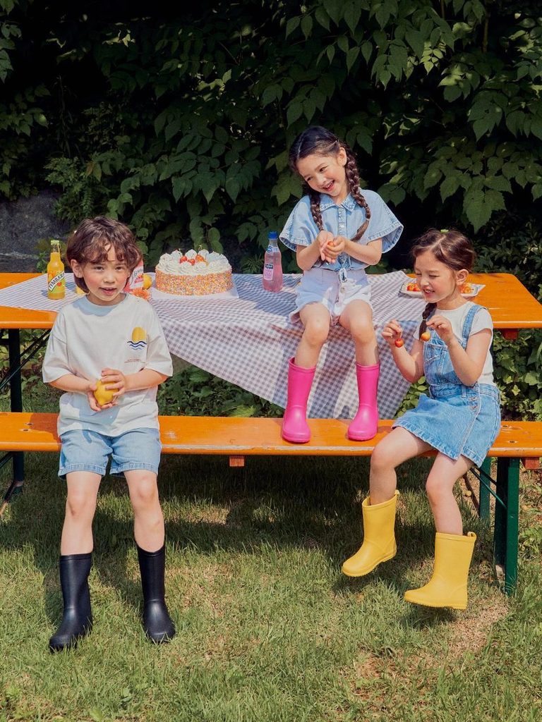 kids in matching rain boots as matching outfit ideas for siblings