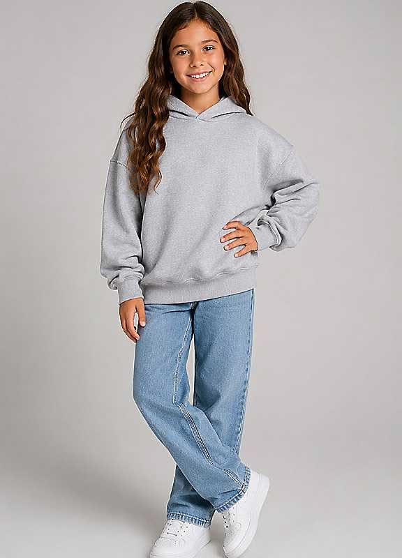 kid in Relaxed Fit Jeans with a Hoodie