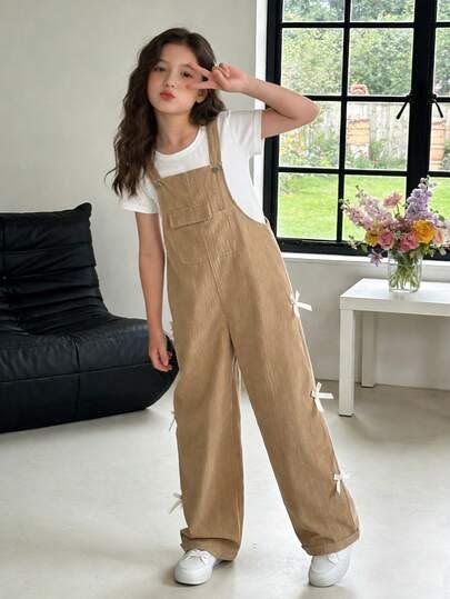 kid in Simple Overalls with a Basic Tee as one of everyday outfit ideas for kids