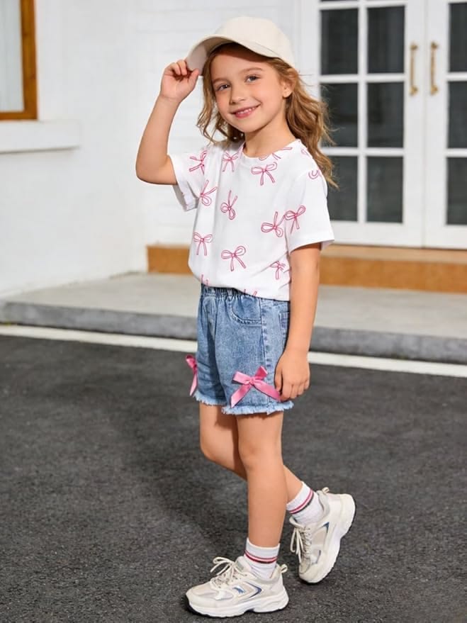 kid in short denim and top