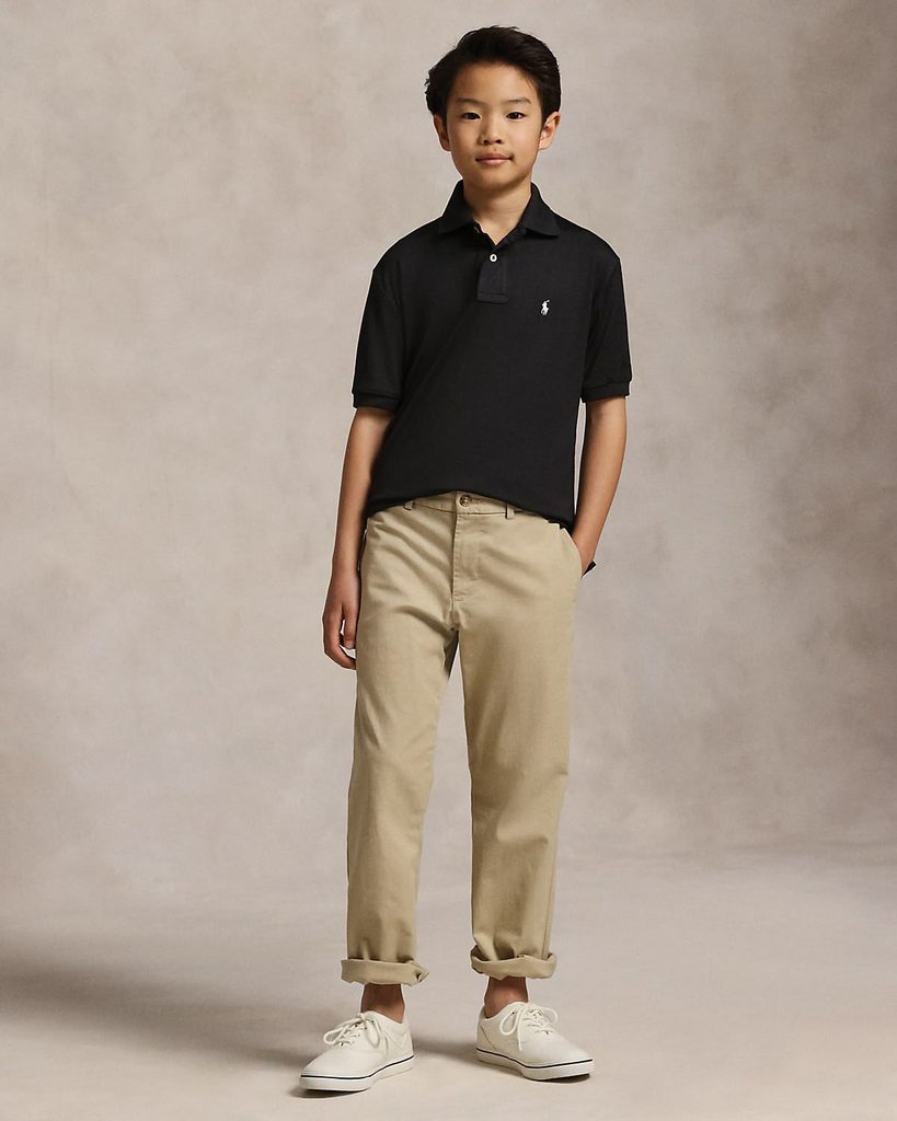 kid in stretch twill pant with a performance polo