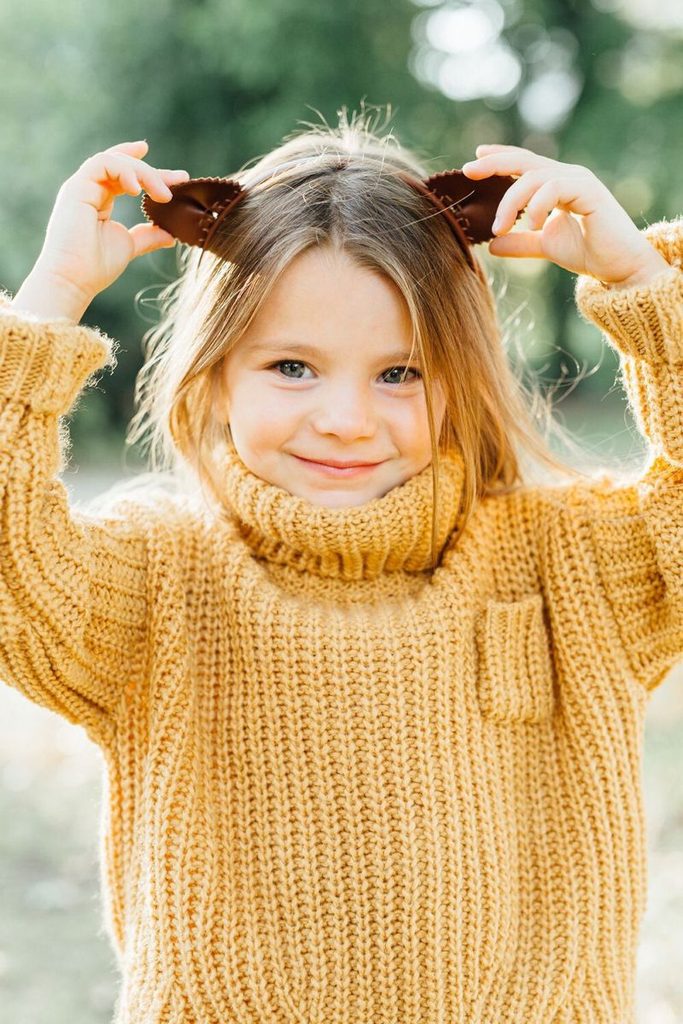 kid in turtleneck sweater