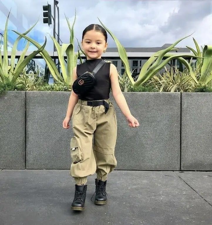 kid in baggy pant and a tank
