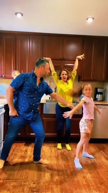 family dancing together