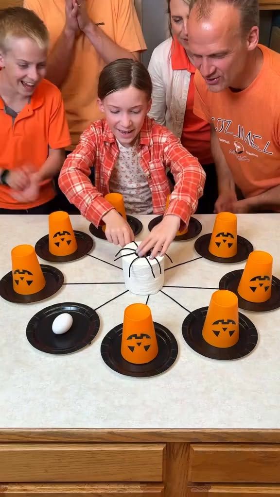 family playing halloween game