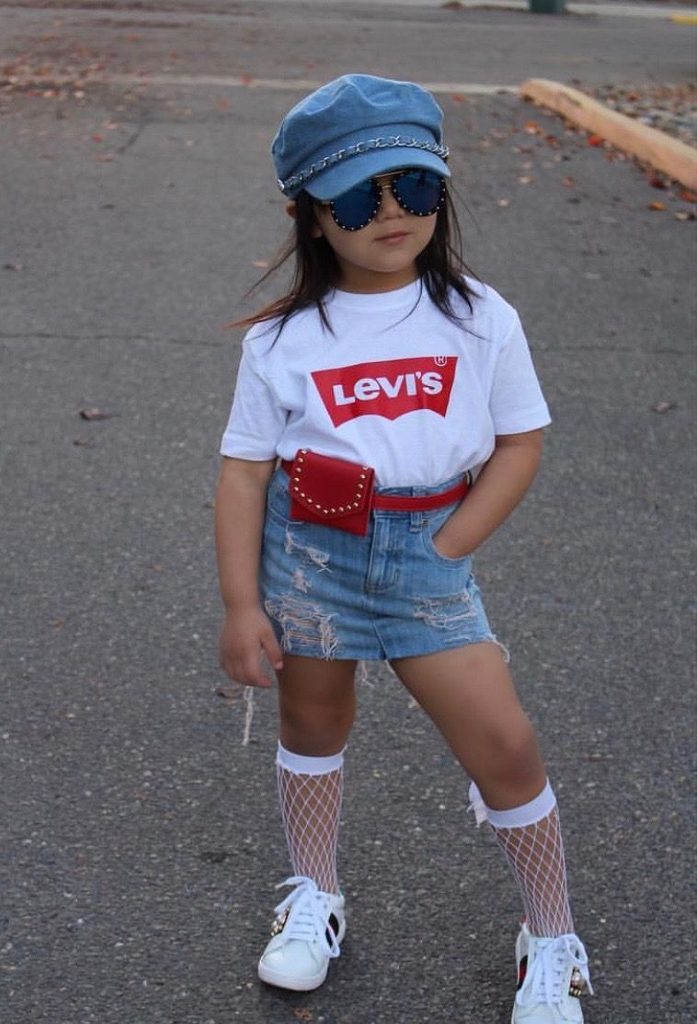 kid in denim skirt with stuck in Tee