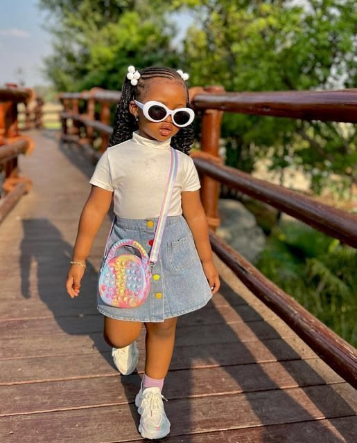 kid in denim skirt with top as one of the ways to dress your child for their body type