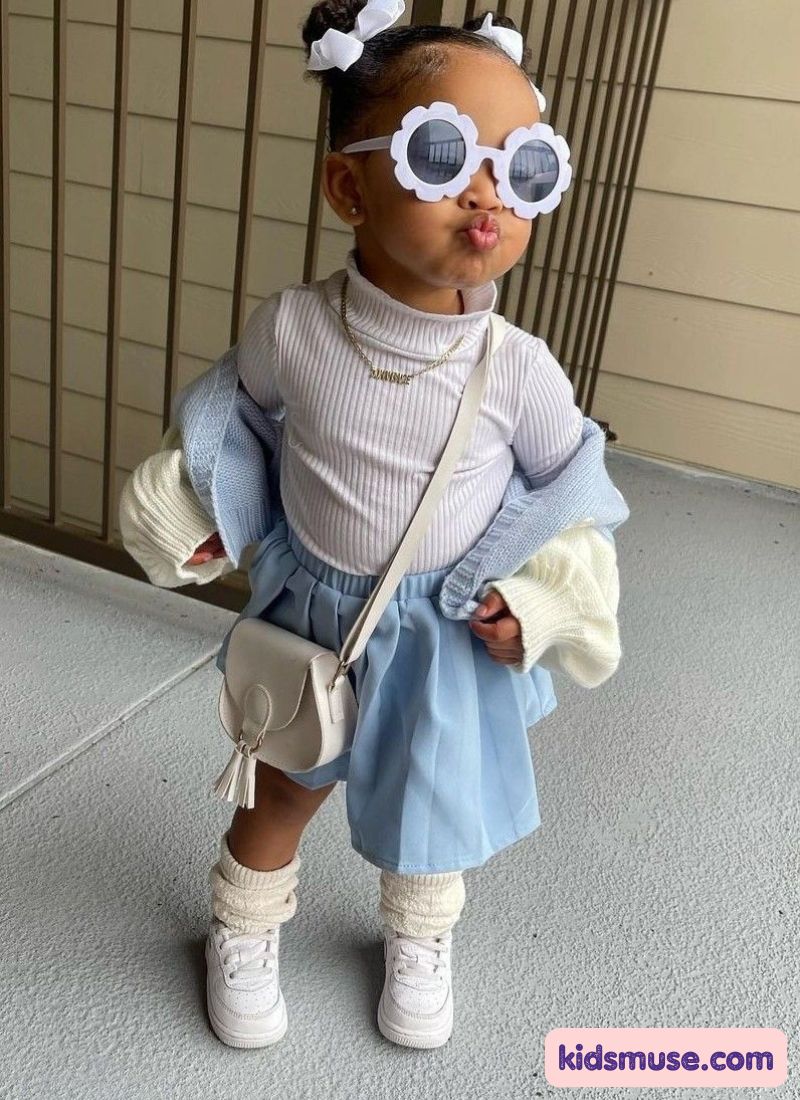kid in flay skirt and jacket