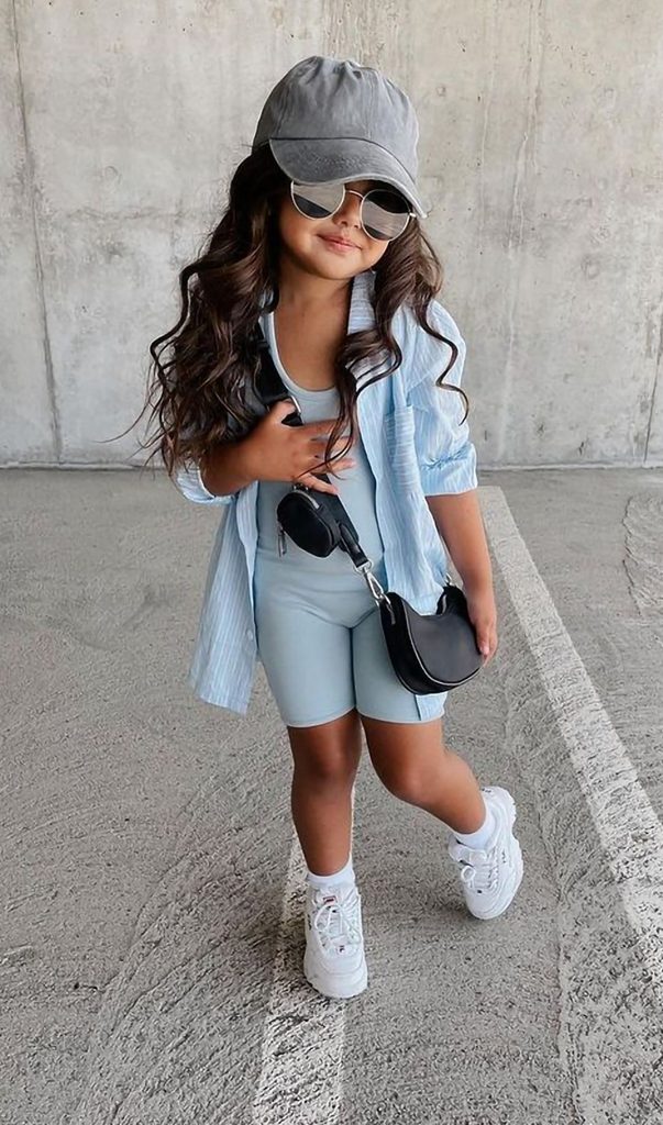 kid in overall with jacket