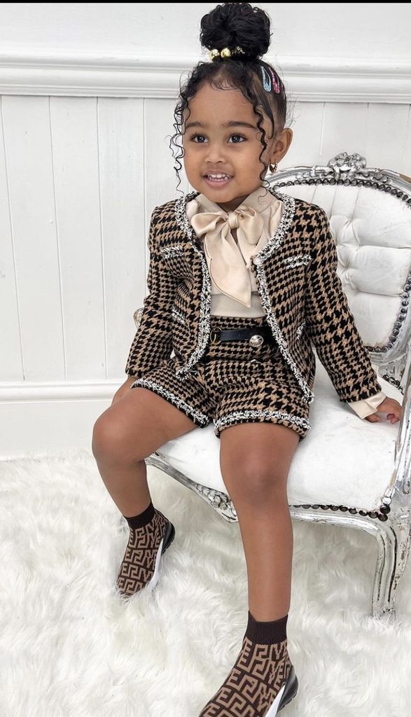 kid in shorts and jacket as one of the ways to dress your child for their body type
