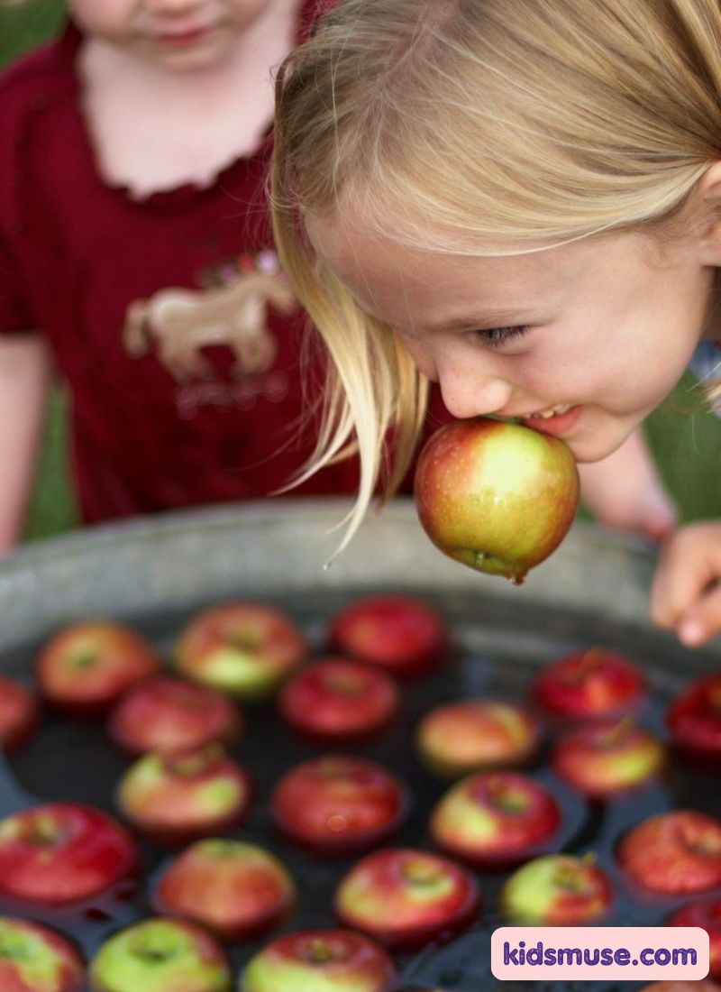kids playing apple bobbing game