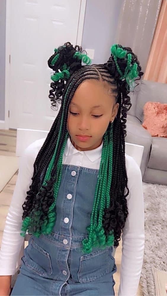 a kid with Christmas hairstyles for little girls