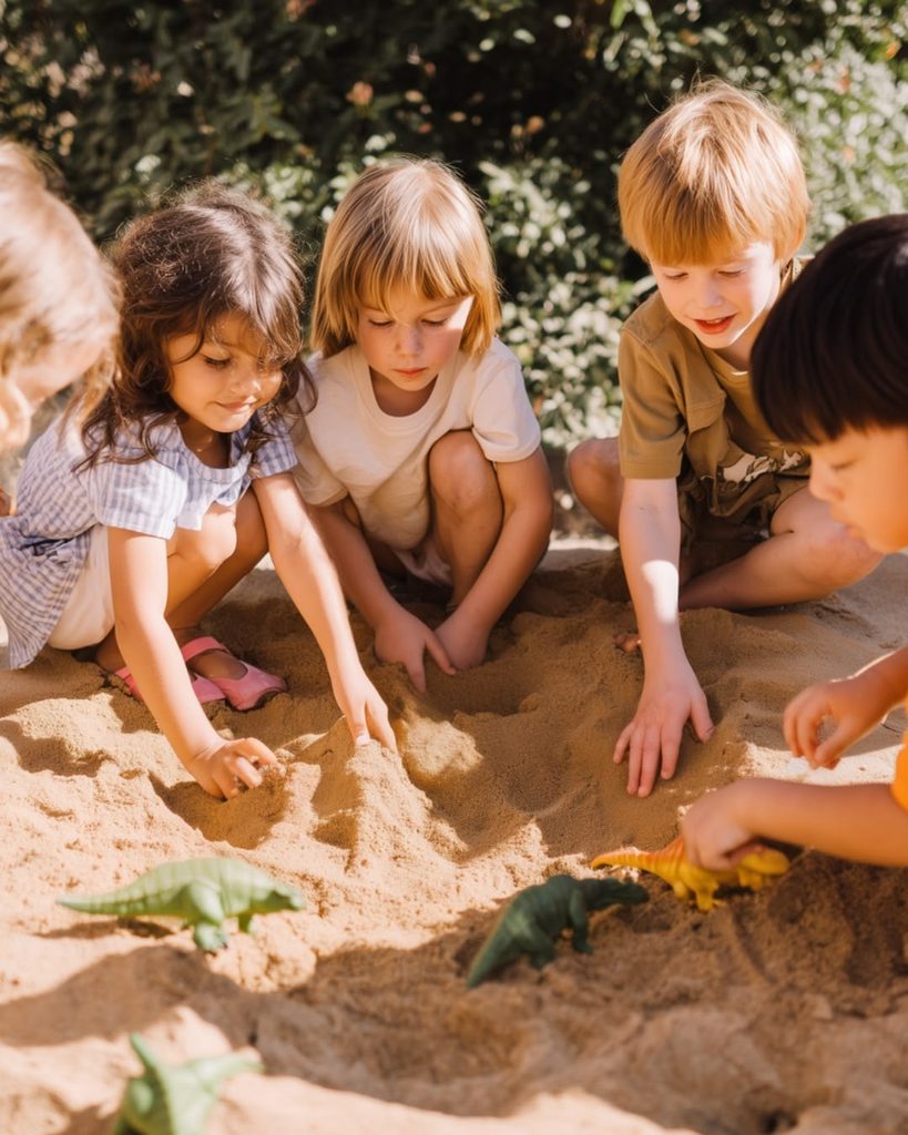 kids digging the sand in search of dinosaur as of one dinosaur dig activity