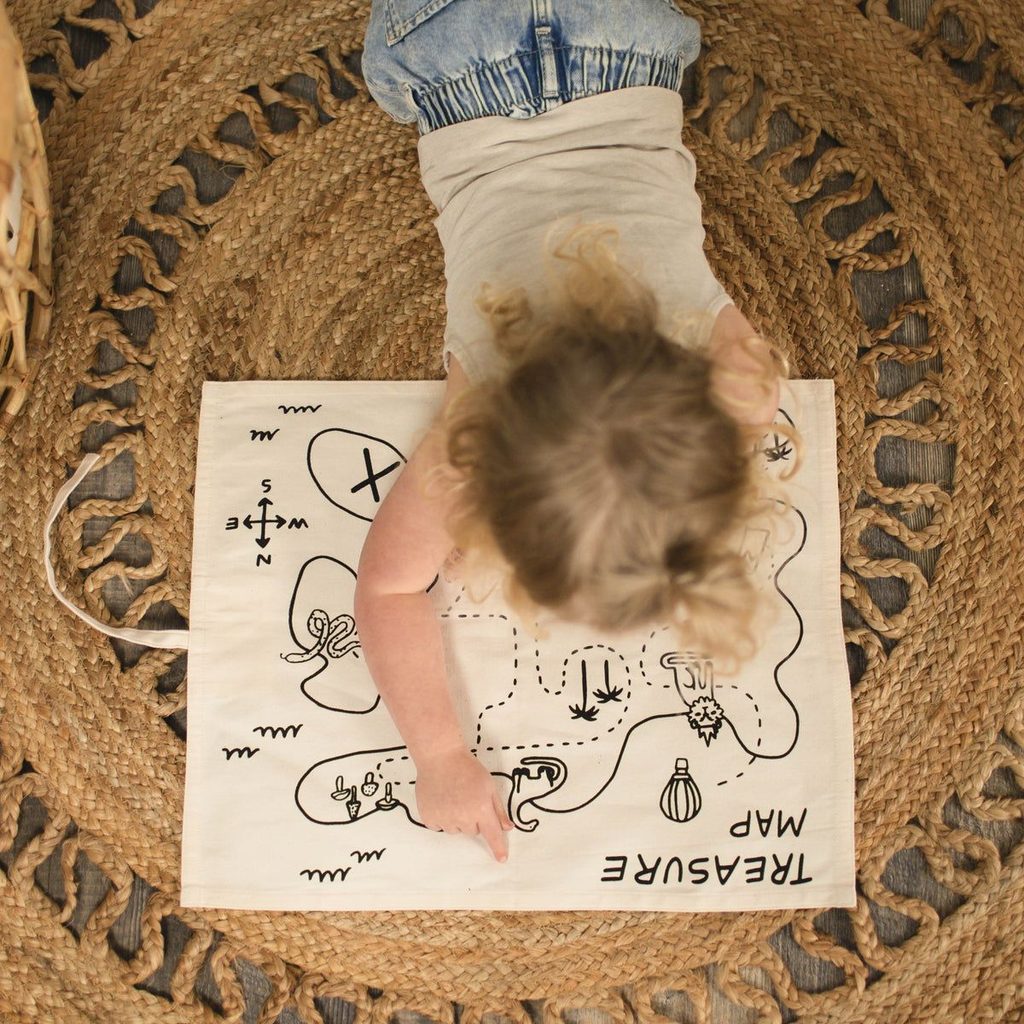 a kid with treasure map